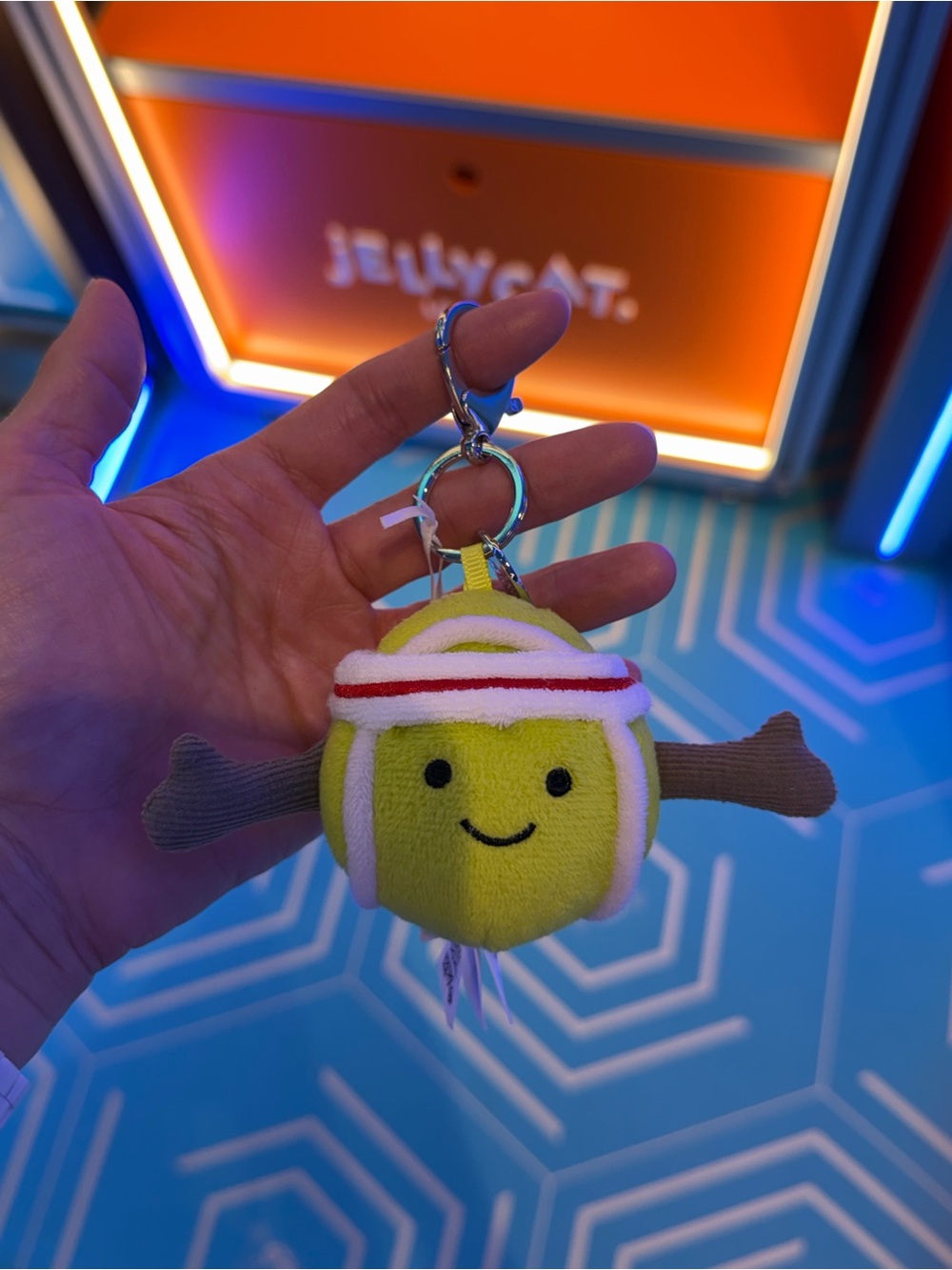 Jellycat Lime Yellow Tennis Ball Keychain with Brown Arms